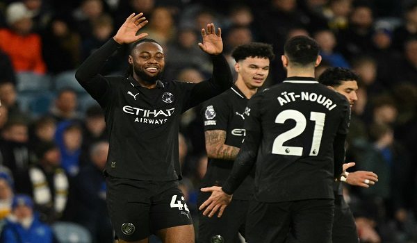 Manchester City's Ghanaian midfielder #42 Antoine Semenyo (L) celebrates with Manchester City's Algerian defender #21 Rayan Ait-Nouri (R) after scoring the opening goal of the English Premier League football match between Leeds United and Manchester City at Elland Road in Leeds, northern England on February 28, 2026. (Photo by Oli SCARFF / AFP) / RESTRICTED TO EDITORIAL USE. NO USE WITH UNAUTHORIZED AUDIO, VIDEO, DATA, FIXTURE LISTS, CLUB/LEAGUE LOGOS OR 'LIVE' SERVICES. ONLINE IN-MATCH USE LIMITED TO 120 IMAGES. AN ADDITIONAL 40 IMAGES MAY BE USED IN EXTRA TIME. NO VIDEO EMULATION. SOCIAL MEDIA IN-MATCH USE LIMITED TO 120 IMAGES. AN ADDITIONAL 40 IMAGES MAY BE USED IN EXTRA TIME. NO USE IN BETTING PUBLICATIONS, GAMES OR SINGLE CLUB/LEAGUE/PLAYER PUBLICATIONS. /