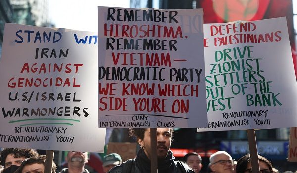 People attend a protest against U.S. and Israel strikes against Iran, during a rally in Times Square, in the Manhattan borough of New York City, U.S., February 28, 2026.  REUTERS/Heather Khalifa