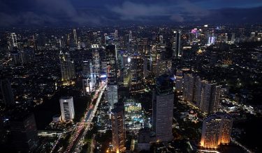 High-rise buildings stand during evening rush hours as seen from the UP at Thamrin Nine observatory deck in Jakarta, Indonesia, January 14, 2026. REUTERS/Willy Kurniawan