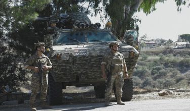 Lebanese army soldiers patrol a street at the entrance of southern Lebanese village of Froun on June 30, 2026. Israeli Prime Minister Benjamin Netanyahu visited troops in southern Lebanon on June 30, vowing that his country's forces would stay in the area as long as Iran-backed Hezbollah remained a "threat". (Photo by Kawnat HAJU / AFP) /