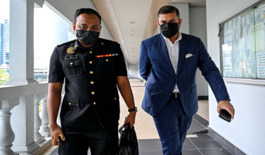 P. Kuhan Arunasalam didakwa meminta suapan RM5 juta daripada seorang individu sebagai dorongan agar Suruhanjaya Sekuriti tidak mengambil tindakan undang-undang ke atas sebuah syarikat amanah dan pengurusan harta, Julai lalu/BERNAMA