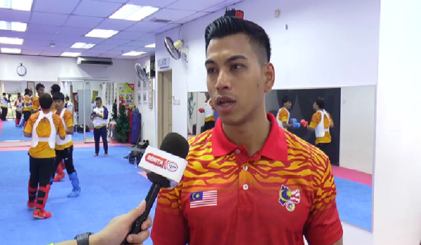 Jurulatih skuad karate orang pekak negara, Caleb Zheng/RTM