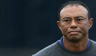 (FILES) US golfer Tiger Woods reacts on the 18th green after his first round 79 on the opening day of the 152nd British Open Golf Championship at Royal Troon on the south west coast of Scotland on July 18, 2024. Golf superstar Tiger Woods was involved in a car crash in Florida on March 27, 2026, US media reports citing local law enforcement said. There was no immediate word on Woods' condition following the incident in Jupiter Island, ABC television reported. (Photo by Paul ELLIS / AFP) / RESTRICTED TO EDITORIAL USE