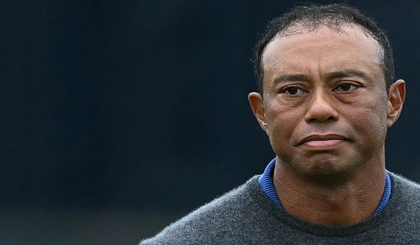 (FILES) US golfer Tiger Woods reacts on the 18th green after his first round 79 on the opening day of the 152nd British Open Golf Championship at Royal Troon on the south west coast of Scotland on July 18, 2024. Golf superstar Tiger Woods was involved in a car crash in Florida on March 27, 2026, US media reports citing local law enforcement said. There was no immediate word on Woods' condition following the incident in Jupiter Island, ABC television reported. (Photo by Paul ELLIS / AFP) / RESTRICTED TO EDITORIAL USE