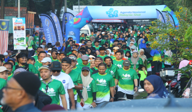Suasana di pintu masuk Taman Rekreasi Paya Bakau, Sijangkang yang dibanjiri peserta berbaju hijau sempena program riadah komuniti yang diadakan pada pagi Ahad lalu / JKNS