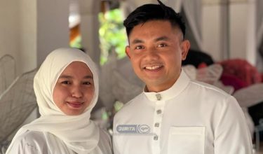 Pasangan raja sehari Nurul Azyyati Mohd Zainuddin (kiri) dan Mohd Nasruluddin Asnan