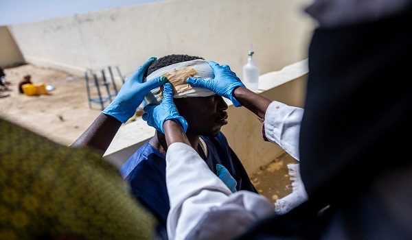 Mahamat Hamid Abakar, 33, who suffered head and leg injuries during a drone attack on the vehicle he was traveling in near Um Baru, Sudan, is being treated by nurses at the hospital in Tine, Wadi Fira, Chad, on January 30, 2026. Most of the wounded crossing the border are victims of drones, which have been much deployed in strikes by both sides in the conflict. Since April 2023, Sudan's government army has been fighting its former allies in the paramilitary Rapid Support Forces (RSF).
The war has killed tens of thousands of people, displaced more than 13 million, according to the United Nations, and triggered a humanitarian crisis. (Photo by Joris Bolomey / AFP)