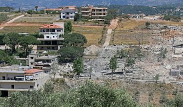 A Lebanese army bulldozer advances along the main road in the southern border village of Debbine on June 4, 2026, as the Israeli military reportedly begins a gradual withdrawal from the village. Israel carried out new strikes in Lebanon and again threatened Beirut, despite the two countries agreeing to a conditional ceasefire that Lebanon's president called the "last chance" for a durable end to the fighting. (Photo by AFP)