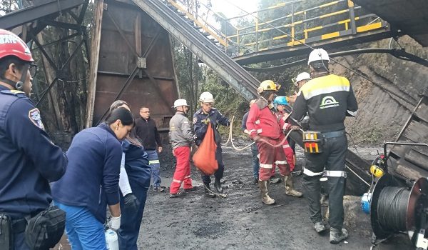 This handout picture released by the Cundinamarca Fire Department shows firefighters inspecting the site of an explosion at a coal mine in Sutatausa, Cundinamarca department, Colombia on May 4, 2026. Twelve people were trapped after a mine explosion "apparently due to a buildup of gases" in central Colombia on May 4, 2026, the regional governor Jorge Emilio Rey said. (Photo by Handout / Cundinamarca Fire Department / AFP) / RESTRICTED TO EDITORIAL USE - MANDATORY CREDIT "AFP PHOTO / CUNDINAMARCA FIRE DEPARTMENT" - HANDOUT - NO MARKETING NO ADVERTISING CAMPAIGNS - DISTRIBUTED AS A SERVICE TO CLIENTS