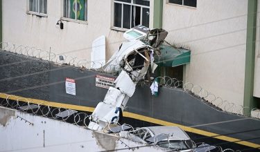 Wreckage of a small plane after crashing into a building is pictured in the downtown of Belo Horizonte, Minas Gerais state, Brazil, on May 4, 2026. (Photo by GLEDSTON TAVARES / AFP)