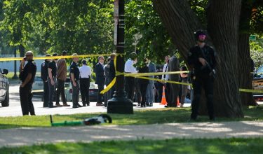 U.S. Secret Service personnel and police officers gather at the scene of an officer-involved shooting in Washington, D.C., U.S., May 4, 2026. REUTERS/Jonathan Ernst