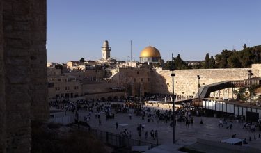 Jewish worshippers gather in front of the Western Wall, which forms part of the retaining wall of the al-Aqsa Mosque complex that is home to the Dome of the Rock (C-Top), Islams third-holiest site in the Old City of Jerusalem on August 4, 2026. The Jordan Foreign Ministry said in a statement on August 3, 2026 that Jordan will host a meeting on August 5, of the Arab ministerial committee, which will bring together Arab foreign ministers including the Secretary-General of the Arab League, and the foreign ministers of Indonesia, Pakistan, Turkey and Malaysia to discuss the situation in Jerusalem and its Islamic and Christian holy sites, aiming to coordinate a common position against what they describe as escalating and illegal Israeli actions targeting the city's identity and its religious sanctities. (Photo by AHMAD GHARABLI / AFP)