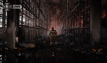 This handout photograph taken and released by Ukrainian State Emergency Service on August 5, 2026 shows rescuers working outside a warehouse premises damaged following massive Russian ballistic missile and drones strikes in the Ukrainian capital of Kyiv, amid the Russian invasion in Ukraine. Russian missile and drone strikes killed at least 17 people and wounded dozens more in Kyiv and the surrounding region overnight, authorities said August 5, 2026, the latest in a wave of deadly attacks on Ukraine. Kyiv was unable to shoot down any of the missiles launched by Russia, whose intensifying missile attacks have prompted Kyiv to plead for more US-made Patriot interceptors. (Photo by Handout / Ukrainian State Emergency Service / AFP)