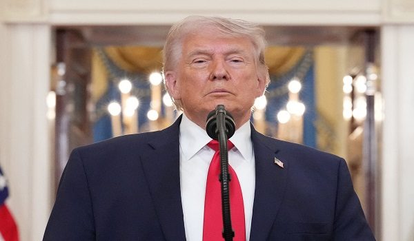 US President Donald Trump pauses as he finishes speaking during a televised address on the conflict in the Middle East from the Cross Hall of the White House in Washington, DC on April 1, 2026. President Donald Trump made his case for attacking Iran in his first nationwide address more than a month into the war, insisting the United States was close to victory as his approval rating sinks. In an evening speech from the White House, Trump broke little new ground on how the war would end and vowed two to three weeks further of "extremely hard" strikes against Iran. (Photo by Alex Brandon / POOL / AFP)