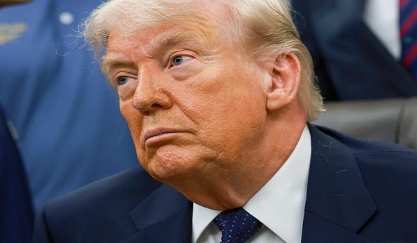 WASHINGTON, DC - MAY 05: U.S. President Donald Trump looks on during a proclamation signing in the Oval Office of the White House on May 05, 2026 in Washington, DC. President Trump signed a presidential memorandum restoring the Presidential Fitness Test Award, which was reinstated by executive order in July 2025 and reintroduces a performance-based benchmark in physical education.   Anna Moneymaker/Getty Images/AFP (Photo by Anna Moneymaker / GETTY IMAGES NORTH AMERICA / Getty Images via AFP)