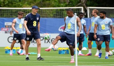 Soccer Football - International Friendly - England Training - The Gardens North County District Park, Palm Beach Gardens, Florida, U.S. - June 5, 2026   England manager Thomas Tuchel and Ezri Konsa during training IMAGN IMAGES via Reuters/Jim Rassol