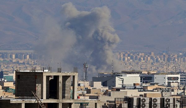 Smoke rises from the site of airstrikes in a central area of the Iranian capital Tehran on March 6, 2026. Fresh strikes rocked Iran and Lebanon on March 6, as Israel vowed to escalate to a new phase in the Middle East war that has spiralled rapidly throughout the region and beyond. (Photo by ATTA KENARE / AFP)