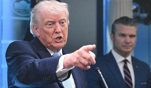 US President Donald Trump, alongside Secretary of Defense Pete Hegseth, speaks about the conflict in Iran in the James S. Brady Press Briefing Room of the White House on April 6, 2026, in Washington, DC. (Photo by SAUL LOEB / AFP)