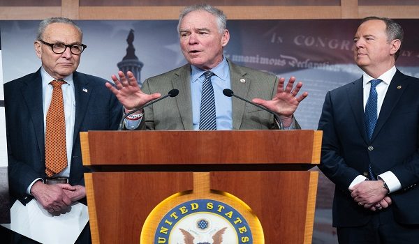 US Senator Tim Kaine (C), Democrat of Virginia, speaks alongside US Senate Minority Leader Chuck Schumer (L), Democrat of New York, and US Senator Adam Schiff (R), Democrat of California, during a press conference after a US Senate vote on a War Powers Resolution blocking further US military action in Venezuela at the US Capitol in Washington, DC, January 8, 2026. The US Senate took a major step Thursday toward passing a resolution to rein in President Donald Trump's military actions in Venezuela -- a rare bipartisan rebuke following alarm over the secretive capture of leader Nicolas Maduro. The Democratic-led legislation, which bars further US hostilities against Venezuela without explicit congressional authorization, got through a key procedural vote with support from five Republicans. (Photo by SAUL LOEB / AFP)