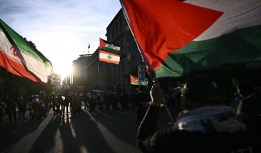 Demonstrators wave Palestinian flags alongside flags of Iran and Lebanon during a protest against US military action in Iran near the White House in Washington, DC, on April 8, 2026. The fragile two-week truce between Iran and the United States was hanging in the balance on April 8, with Tehran threatening to resume hostilities as Israel launched a major bombardment of Lebanon. (Photo by Brendan SMIALOWSKI / AFP)