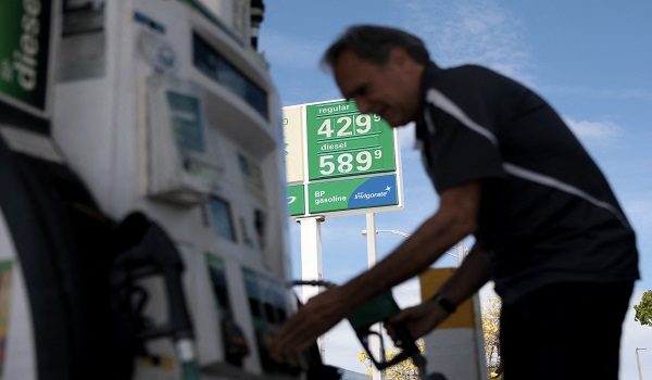 MIAMI, FLORIDA - APRIL 06: Carlos Ferre puts fuel in his vehicle at a gas station on April 06, 2026 in Miami, Florida. Florida gas prices have risen to over $4 per gallon in early April 2026 as the war in Iran has affected global oil supplies, leading to higher crude oil costs.   Joe Raedle/Getty Images/AFP (Photo by JOE RAEDLE / GETTY IMAGES NORTH AMERICA / Getty Images via AFP)