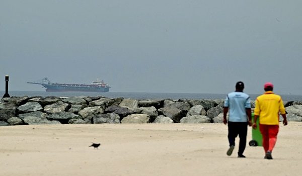 A ship is seen in the Persian Gulf off the coast of Sharjah the day after the failure of US-Iran peace talks on April 13, 2026. The failure of US-Iran peace talks has left the US President with several unpalatable options, as analysts say his order to blockade the strategic Strait of Hormuz could further complicate his next move on April 12, 2026. Any hopes that US Vice President would emerge from the marathon day of negotiations with top Iranian officials with a deal to end a war that has rippled across the Middle East were dashed when he left hosts Pakistan emptyhanded. (Photo by AFP)