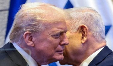 FILE PHOTO: U.S. President Donald Trump and Israeli Prime Minister Benjamin Netanyahu at the Knesset on the day of Trump's address, amid a U.S.-brokered prisoner-hostage swap and ceasefire deal between Israel and Hamas, in Jerusalem, October 13, 2025. REUTERS/Evelyn Hockstein/Pool/File Photo