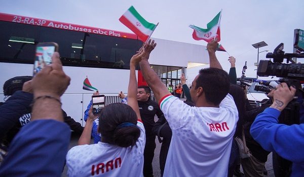 FIFA World Cup 2026 - Team Iran arrives at Tijuana for World Cup - Tijuana International Airport, Tijuana, Mexico - June 7, 2026  Iran fans look on as the bus arrives REUTERS/Victor Medina