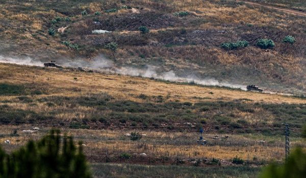 Israeli military vehicles drive on a road in southern Lebanon, as seen from the Israeli side of the Israel-Lebanon border, June 8, 2026. REUTERS/Ayal Margolin    ISRAEL OUT. NO COMMERCIAL OR EDITORIAL SALES IN ISRAEL