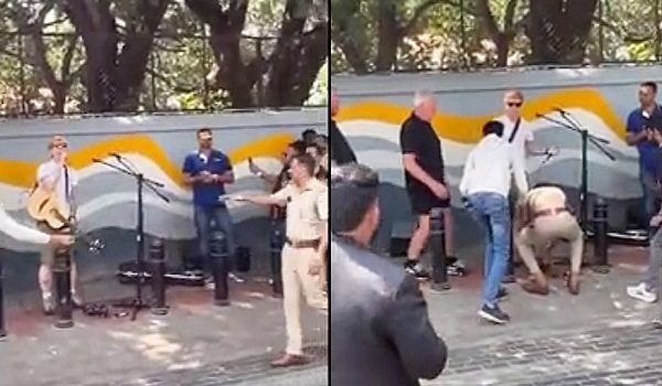 Tidak menyedari identiti Ed Sheeran, pegawai polis meminta beliau menghentikan persembahan kerana mendakwa tiada kebenaran rasmi/Reuters