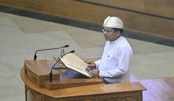 Former Myanmar military chief and Myanmar president Min Aung Hlaing delivers a speech as he attends his sworn-in ceremony during a session of the Pyidaungsu Hluttaw (Union Parliament) in Naypyidaw on April 10, 2026. Myanmar junta chief Min Aung Hlaing was sworn in as president on April 10, 2026, AFP journalists saw, continuing his rule from a civilian post five years after snatching power in a coup. (Photo by Sai Aung MAIN / AFP)