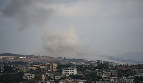 A photograph taken from the southern city of Nabatieh shows smoke rising from the site of an Israeli airstrike on the village of Nabatieh al-Faouqa on July 5, 2026. Hezbollah drew Lebanon into the Middle East war on March 2 with rocket fire at Israel to avenge the killing of Iran's supreme leader in US-Israeli strikes days earlier. Israel responded with heavy airstrikes and a ground invasion of southern Lebanon, where its troops still occupy swathes of territory near the border. (Photo by Abbas FAKIH / AFP) /
