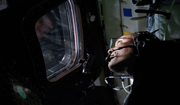 FILE PHOTO: NASA astronaut and Artemis II Pilot Victor Glover is pictured here in the Orion spacecraft during the Artemis II lunar flyby April 6, 2026. NASA/Handout via REUTERS THIS IMAGE HAS BEEN SUPPLIED BY A THIRD PARTY./File Photo