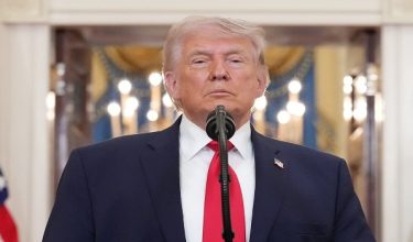 US President Donald Trump pauses as he finishes speaking during a televised address on the conflict in the Middle East from the Cross Hall of the White House in Washington, DC on April 1, 2026. President Donald Trump made his case for attacking Iran in his first nationwide address more than a month into the war, insisting the United States was close to victory as his approval rating sinks. In an evening speech from the White House, Trump broke little new ground on how the war would end and vowed two to three weeks further of "extremely hard" strikes against Iran. (Photo by Alex Brandon / POOL / AFP)
