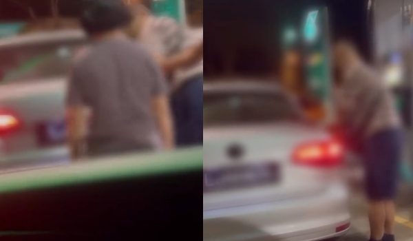 Tular sebuah kereta dengan nombor pendaftaran Singapura menutup sebahagian plat mengaburi tindakannya mengisi RON95 di sebuah stesen minyak di Kulai./Foto tular