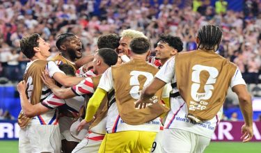 US players celebrate the fourth goal by midfielder #07 Giovanni Reyna during the 2026 World Cup Group D football match between USA and Paraguay at the Los Angeles Stadium in Inglewood on June 12, 2026. (Photo by Frederic J. BROWN / AFP)