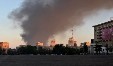 This photograph shows smoke rising above buildings following an air attack in Kharkiv on June 10, 2026, amid the Russian invasion of Ukraine. (Photo by SERGEY BOBOK / AFP)