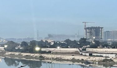 Smoke rises following a drone attack on the US embassy in Baghdad on March 14, 2026. A drone struck the US embassy in Baghdad on March 14, an Iraqi security official said, as an AFP journalist saw smoke rising from the complex. (Photo by AFP)