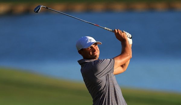 PONTE VEDRA BEACH, FLORIDA - MARCH 13: Ludvig Aberg of Sweden hits his second shot on the 18th hole during the second round of THE PLAYERS Championship 2026 at THE PLAYERS Stadium course at TPC Sawgrass on March 13, 2026 in Ponte Vedra Beach, Florida. (Photo by David Cannon/Getty Images) (Photo by DAVID CANNON / David Cannon Collection / Getty Images via AFP)