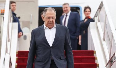 This handout photograph taken and released by the Russian Foreign Ministry on April 14, 2026 shows Russia's Foreign Minister Sergei Lavrov disembarking from a plane as he arrives in Beijing. (Photo by Handout / RUSSIAN FOREIGN MINISTRY / AFP) / RESTRICTED TO EDITORIAL USE - MANDATORY CREDIT "AFP PHOTO / RUSSIAN FOREIGN MINISTRY" - HANDOUT - NO MARKETING NO ADVERTISING CAMPAIGNS - DISTRIBUTED AS A SERVICE TO CLIENTS