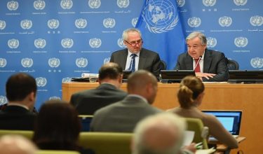 United Nations Secretary General Antonio Guterres with Stephane Dujarric (L), Spokesman for the Secretary General speaks during a press briefing at United Nations Headquarters on February 4, 2020 in New York City. (Photo by Angela Weiss / AFP)