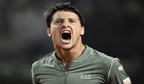 Italy's Luciano Darderi celebrates a point against Spain's Rafael Jodar during the ATP Rome Open tennis tournament at Foro Italico in Rome on May 13, 2026. (Photo by Tiziana FABI / AFP)