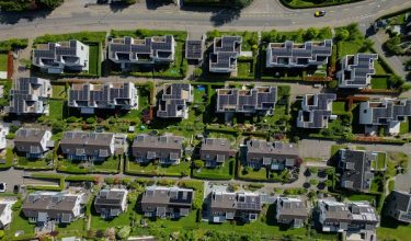 A drone view shows newly constructed dwellings in the village of Knonau, ahead of a June 14 vote on a plan backed by the right-wing Swiss People's Party (SVP) to curb population growth to 10 million inhabitants, in Knonau, Switzerland, May 21, 2026. REUTERS/Cecile Mantovani