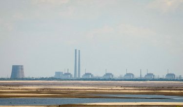 FILE PHOTO: A view shows Zaporizhzhia Nuclear Power Plant from the bank of Kakhovka Reservoir near the town of Nikopol after the Nova Kakhovka dam breached, amid Russia's attack on Ukraine, in Dnipropetrovsk region, Ukraine June 16, 2023. REUTERS/Alina Smutko/File Photo/File Photo