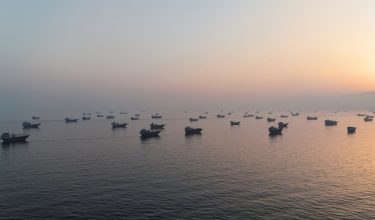 A drone view shows vessels in the Strait of Hormuz, as seen from Musandam, Oman, June 15, 2026. REUTERS/Stringer