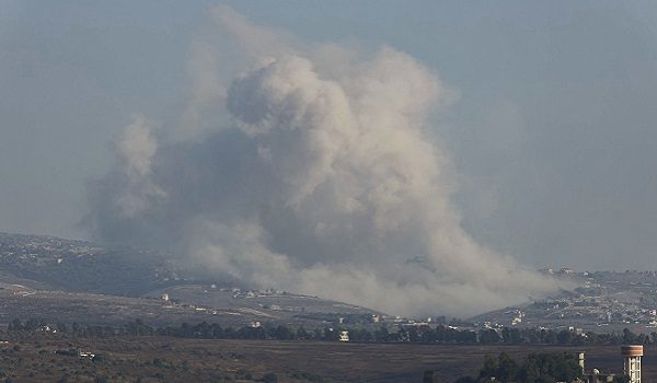 This picture taken from the southern Lebanese village of Zawtar al-Gharbiyah shows smoke billowing from the site of an Israeli controlled explosion in the village of Bani Hayyan on August 13, 2026. Lebanese Prime Minister Nawaf Salam on August 12 condemned Israel's "systematic destruction" in the country's south as a violation of international law, as Israel's defence minister said its military was "destroying all the houses" there. (Photo by Ammar Ammar / AFP) /