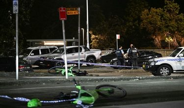 Police work at the scene after a shooting incident at Bondi Beach in Sydney on December 14, 2025. Two gunmen opened fire at Sydney's Bondi Beach on December 14, killing 11 people and wounding multiple others in a "terrorist incident" during a gathering for the Jewish festival of Hanukkah. (Photo by Saeed KHAN / AFP)