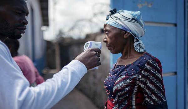A staff member of the CBCA Virunga Hospital checks a visitor’s temperature using a a contactless infrared thermometer, before allowing her access to the hospital in Goma on May 17, 2026. A first case of Ebola virus infection has been reported in Goma, a major city in eastern Democratic Republic of Congo controlled by the M23 armed group, with the WHO declaring an international health alert on Sunday.
According to figures released Saturday by the African Union’s health agency (Africa CDC), 88 deaths likely caused by the virus have been recorded, out of 336 suspected cases. One death has been reported in neighboring Uganda. As the epicenter of the outbreak is located in a hard-to-reach area, few samples have been tested in laboratories and the figures are based largely on suspected cases. (Photo by Jospin Mwisha / AFP)