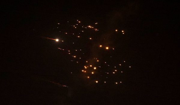 Rocket trails are seen in the sky amid a fresh barrage of Iranian missile attacks above the Israeli coastal city of Netanya on March 18, 2026. (Photo by JACK GUEZ / AFP) /