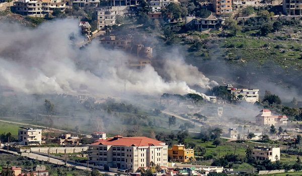 Smoke plumes billow on the outskirts of the village of Khiam in southern Lebanon near the boder with Israel on March 17, 2026 during Israeli military operations in the area. Lebanon was drawn into the Middle East war on March 2 when pro-Iran Hezbollah launched rockets towards Israel in response to US-Israeli strikes that killed Iranian supreme leader Ayatollah Ali Khamenei. (Photo by AFP) /